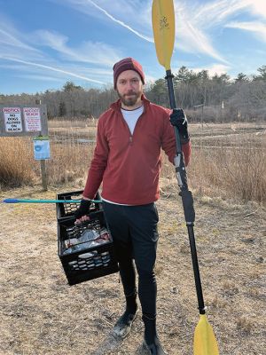 Waterway Clean-up
Kyle Kossak caused some concern when he was spotted in his kayak in Hiller Cove off Aucoot Road, but it turns out the mechanical engineer from Newport, Rhode Island, was not shell fishing, he was cleaning up trash along Mattapoisett’s shoreline. For several years now, Kossak has made a weekly hobby of picking out spots along the southern New England shoreline, taking his kayak out to selected sites and retrieving trash. Photo courtesy of Town of Mattapoisett
