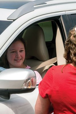 Class of 2020 
Graduating seniors in the Old Rochester Regional High School Class of 2020 drove around to the back of the school building on May 28, where they were greeted by faculty and administration. After arriving in order of homeroom to ensure safe spacing, the seniors turned in textbooks and received yearbooks, a surprise COVID-19 gift bag, and a long-sleeve t-shirt decorated with the mascot Bulldog and the word ‘Quarantine’ spelled across the front. Photo by Ryan Feeney
