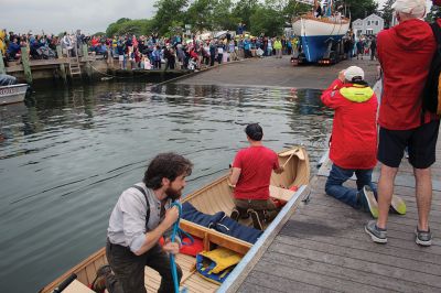 Arabella
A large crowd gathered on a rainy Saturday morning at Shipyard Park and Mattapoisett Harbor to witness the launch of “Acorn to Arabella,” a wooden sailboat made by hand in western Massachusetts. Photos by Mick Colageo
