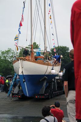 Arabella
A large crowd gathered on a rainy Saturday morning at Shipyard Park and Mattapoisett Harbor to witness the launch of “Acorn to Arabella,” a wooden sailboat made by hand in western Massachusetts. Photos by Mick Colageo
