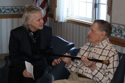 Boston Post Cane
Selectman Naida Parker presented Rochester’s oldest resident with the Boston Post Cane on February 20. Armand Cournoyer, 100, who now resides at the Sippican Healthcare Center, received the cane during a small ceremony while surrounded by friends and three generations of family members. Photos by Jean Perry
