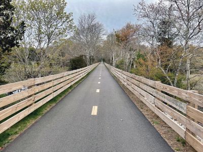 Mattapoisett Bike Path
A newly signed Memorandum of Understanding between the Town of Mattapoisett and the Commonwealth of Massachusetts has opened the Shining Tides section of the Mattapoisett Bike Path. On Monday, people and dogs could be seen along the attractive structure that connects Reservation Road to Goodspeed Island Road. Photo by Faith Ball
