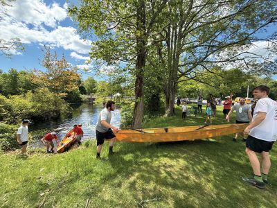Rochester Memorial Day Boat Race
The Rochester Memorial Day Boar Race took place this past Monday. The event, sponsored by the Rochester Fire Department, saw contestants build boats and race south along the Mattapoisett River. According to organizers, the race is 12 miles long, beginning in Grandma Hartley's Reservoir off Snipatuit Road and finishing just before Route 6. Photo by Sam Bishop
