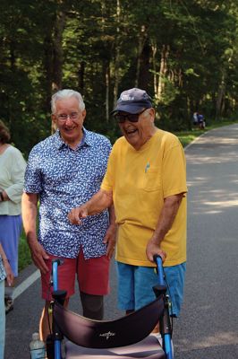 7,000th Mile
Brad Hathaway, 92, walked his 27,000th mile on Saturday, surrounded by a gathering of family and friends while promoting the Priscilla Hathaway Art Scholarship in memory of his late wife. Photos by Mick Colageo
