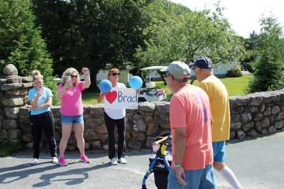 7,000th Mile
Brad Hathaway, 92, walked his 27,000th mile on Saturday, surrounded by a gathering of family and friends while promoting the Priscilla Hathaway Art Scholarship in memory of his late wife. Photos by Mick Colageo
