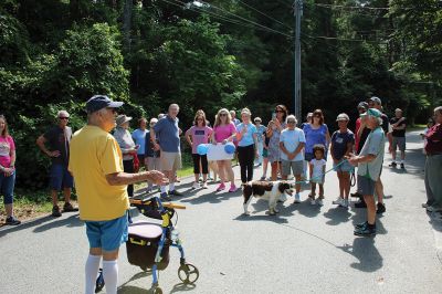 7,000th Mile
Brad Hathaway, 92, walked his 27,000th mile on Saturday, surrounded by a gathering of family and friends while promoting the Priscilla Hathaway Art Scholarship in memory of his late wife. Photos by Mick Colageo
