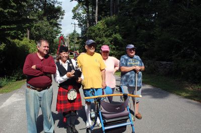 7,000th Mile
Brad Hathaway, 92, walked his 27,000th mile on Saturday, surrounded by a gathering of family and friends while promoting the Priscilla Hathaway Art Scholarship in memory of his late wife. Photos by Mick Colageo
