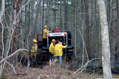 Brush Fire
A five-acre brushfire broke out on the Mattapoisett/Rochester town line on Saturday afternoon in the woods near Wolf Island Road and Long Plain Road. Photo by Eric Trippoli
