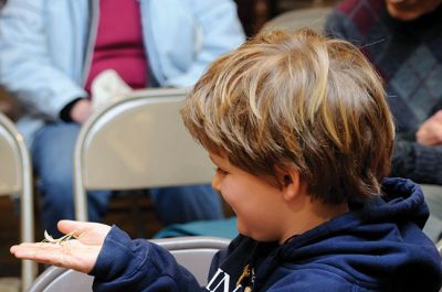 Bugworks
The Marion Natural History Museum provided an opportunity on February 27 to get up close and personal with critters from the insect world, including praying mantises and jumbo-sized grasshoppers. Above: Tapper Crete, 7, was the first one brave enough to ask to touch a praying mantis. The event was hosted by Maire Anne Diamond, owner and educator at ‘Bugworks.’ Photos by Felix Perez
