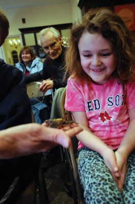 Bugworks
The Marion Natural History Museum provided an opportunity on February 27 to get up close and personal with critters from the insect world, including praying mantises and jumbo-sized grasshoppers. Above: Tapper Crete, 7, was the first one brave enough to ask to touch a praying mantis. The event was hosted by Maire Anne Diamond, owner and educator at ‘Bugworks.’ Photos by Felix Perez
