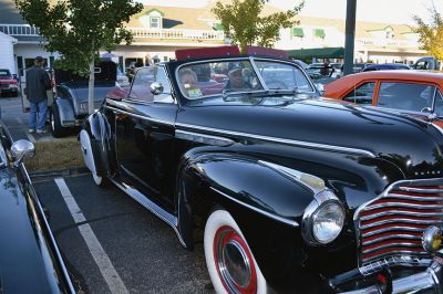 Classic Cars
Classic car enthusiasts from the area gathered Monday nights throughout the summer, riding up in their shiny antique cars and pulling up a lawn chair to sit back and reminisce about the good old days to the sounds of music from the ‘50s and ‘60s. October 12 will be the final classic car show of the year at Plumb Corner, and the biggest. There will be food, a DJ, vendors, and trophies for the top 50 car entries. Photo by Jean Perry
