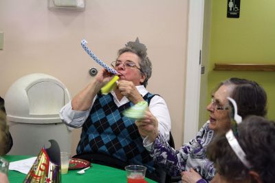 New Year’s Eve Party
A New Year’s Eve party at the Rochester Senior Center gave area seniors the chance to ring in the New Year early in the company of friends. Guests enjoyed dinner and dessert followed by the sharing of New Year’s resolutions and non-alcoholic bubbly. Balloons dropped from the ceiling at 1:30 pm after a symbolic countdown to the New Year, and guests made a ruckus with noisemakers to welcome 2016. Photos by Jean Perry
