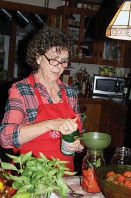 The Can-Do Couple 
Marion and Bob Faelten have been canning together for 50 years, ‘preserving’ the good life and enjoying every step of the twelve-month tango they dance from early spring when they sow their seeds to fall when they enjoy their homemade jellies, pickles, canned tomatoes, and homemade liqueurs. Photos by Jean Perry
