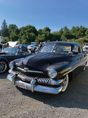 Car Show
The September 5 car show and sock hop held at the Rochester Council on Aging found the grounds filled with more than 85 vintage cars and several hundred spectators. The fundraiser also featured raffles, along with hamburgers and hot dogs cooked up by the Rochester Fire Department. Handling the root beer float station were members of the Police Department. On hand were members of the Plymouth County TRIAD, a nationally recognized program linking seniors with local safety strategies and agencies. 
