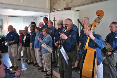 Sea Chantey
The Mattapoisett Museum and Carriage House hosted The New Bedford Sea Chantey Chorus on Sunday afternoon, April 29. The matinee concert featuring a variety of ballads, folk songs and work songs - or chanteys - was played before a full house as patrons filled the old church house to the rafters. Photo by Robert Chiarito
