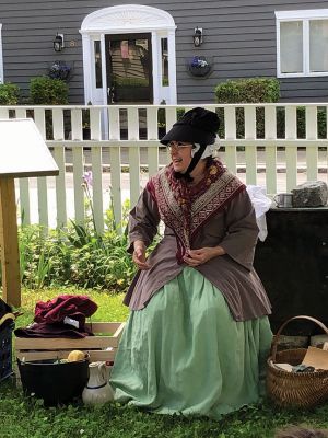 Fairhaven Village Militia
Members of the Fairhaven Village Militia wearing replica clothing visited the Mattapoisett Museum on June 11. Mistress Lori Richard and Master Skip Faulkner brought the past to life, as they shared insights into the colonial days and the lives lived by children during those days. Photos by Marilou Newell
