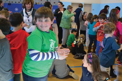 Manguito
Center School students were introduced to Latin rhythms and percussion instruments by the Boston-based educational Latin American music group Manguito during an afternoon presentation on January 24. Manguito members really captured the attention of the kids, resulting in plenty of learning while the group’s sizzling salsa and merengue music resulted in an eruption of dancing and spontaneous conga lines. Photo by Jean Perry
