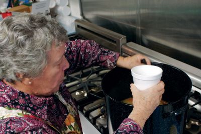 Cranbery Christmas 
A luncheon was served during the Rochester Women's Guild Cranbery Christmas bazaar on Saturday, November 10.  Guild member Carolyn Gray (pictured) ladles out some home-made chicken and rice soup for a patron.  Photo by Eric Tripoli. 
