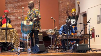 Crocodile River Music
On Saturday, May 17, as part of Art Week, the Marion Arts Center presented Crocodile River Music performing West African music and dance in Marion's Music Hall to an audience of about 70 people. A few children danced happily along with members of Crocodile River Music during several pieces. For the final piece of the event, almost everyone was up and dancing. The energy was terrific. Photos courtesy Chuck Green
