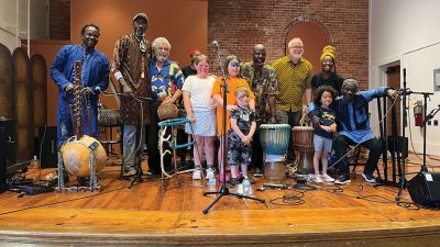 Crocodile River Music
On Saturday, May 17, as part of Art Week, the Marion Arts Center presented Crocodile River Music performing West African music and dance in Marion's Music Hall to an audience of about 70 people. A few children danced happily along with members of Crocodile River Music during several pieces. For the final piece of the event, almost everyone was up and dancing. The energy was terrific. Photos courtesy Chuck Green
