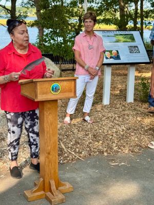 DePina Landing
Members of the public and the DePina family gather around a new commemorative plaque at the rededication ceremony for DePina Landing on Wednesday, August 14. Photo by Robert Pina
