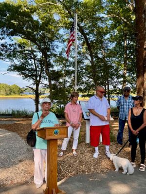 DePina Landing
Members of the public and the DePina family gather around a new commemorative plaque at the rededication ceremony for DePina Landing on Wednesday, August 14. Photo by Robert Pina
