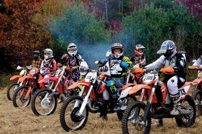 Plymouth Sands Trail Riders 
On Sunday, October 28, the Plymouth Sands Trail Riders bike club held a hare scramble at the Mattapoisett landfill.  The club, which boasts over 300 members from all around New England, had over 100 riders participate in the event.  Riders from teens up to seniors took off for the 40 minute races around the 2.5 mile wooded track.  Proceeds from the event will be part of an annual donation the club makes to fund cystic fibrosis research. Photo by Eric Tripoli
