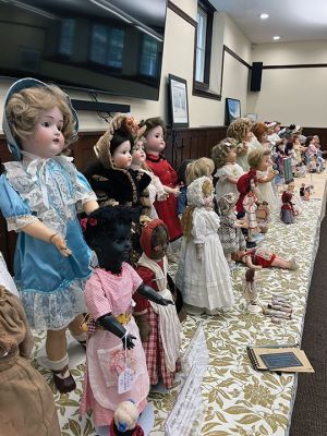 Dolls
Dolls are said to have existed since the Paleolithic Era according to Jenny McIntyre, who on August 6 gave a presentation at the Mattapoisett Free Public Library. The dolls on display spanned from the 1800s to the 1960s, looking out at the audience as McIntyre explained the composition of dolls through the ages. The display showed how dolls reflect the breath of human activity from fancy dress to modest burlap coverings and all walks of life. Photos by Marilou Newell
