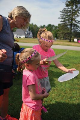 Partial Eclipse, Total Excitement 
The Plumb Library welcomed celestial spectators on Monday for the region’s partial eclipse of the sun, handing out free eclipse glasses. Photos by Glenn C. Silva
