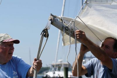 Embarker
Mattapoisett resident Bob Brack launched his sailboat “Embarker” on Monday for the 50th time from the Mattapoisett Boatyard. Brack has owned the same boat for 50 years, a rarity to encounter says former boatyard owner Art Maclean. Seen here, Brack and son Ken head out into Buzzards Bay on this golden anniversary of the first launching of “Embarker.” Photo by Jean Perry
