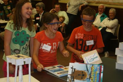 Extreme Engineering
On Tuesday, July 31, dozens of curious students gathered at the Mattapoisett Library to join Dr. Martin Hudis in his Extreme Engineering program.  The students participated in a variety of different exercises using remote controlled helicopters in a hands-on approach to learn valuable lessons in math and science.  The session was the last of four conducted by Dr. Hudis.  Photo by Katy Fitzpatrick.
