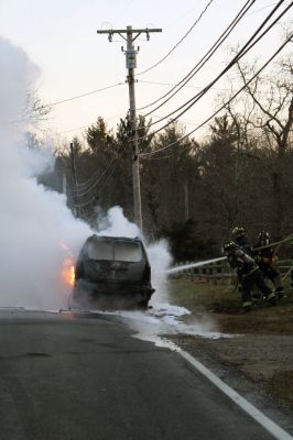 SUV Fire
An SUV was completely consumed by a fire in Rochester on Braley Hill Road, on Saturday evening, January 7, 2012. A passing motorist saw the flames and helped direct the occupants to safety. No injuries were reported, but Police Chief Paul Magee reported that the vehicle was a "total loss". Photo by Laura Fedak Pedulli.
