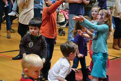 Strengthening Families Fair
There was so much to do and discover on March 1 at the “Strengthening Families Fair”, funded by the Department of Early Education & Care, and coordinated by the Old Rochester Regional School District. The gymnasium at the ORR High School was set up like a kids’ wonderland, with art projects, reading activities, brightly-colored gymnastics equipment, a flowing rainbow parachute, and…everyone’s favorite local children’s music group, “the Toe Jam Puppet Band.” Photo by Jean Perry
