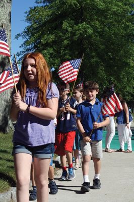 Flag Day
Center School students gathered together with Old Hammondtown students by the Center School flagpole on the morning of Tuesday, June 14, to celebrate Flag Day. The OHS band played a number of tunes, while the Center School students sang patriotic songs and listened to Principal Rose Bowman read a series of poems and writings to remind the children of what the American flag stands for. Afterwards, the third-graders treated the seniors to the school’s annual senior breakfast. Photos by Jean Perry
