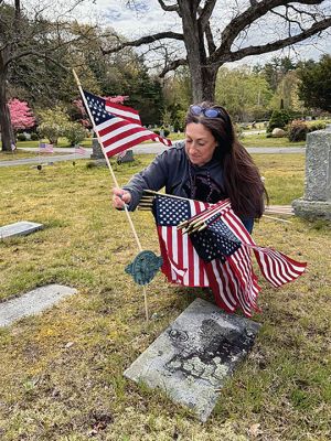 Veteran's Flags
Displaying flags at veterans’ graves. Photo by Robert Pina

