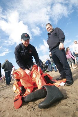 “Freezin’ for a Reason” 
Every year hundreds make waves on New Year’s Day at the Mattapoisett Town Beach for the annual “Freezin’ for a Reason” polar plunge. With the support of local businesses and emergency responders, the event has continued every year, raising thousands of dollars to help local families facing cancer treatment. Photos by Felix Perez
