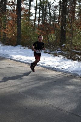 Frosty Runner Road Race
Runners who participated in the third annual Frosty Runner Road Race enjoyed spring-like weather, perfect for a 10 mile or 3 mile run through the neighborhoods of Rochester. The two separate races were run simultaneously, beginning and ending at Old Colony Regional Vocational Technical High School on Saturday February 1. The race was rescheduled from January 25, when the weather was a little too frosty for the event. Photo by Jean Perry
