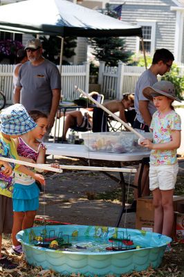 Super Duper Fun Fair
Saturday, July 30, was the day of the annual Super Duper Fun Fair, put on by the First Congregational Church of Marion. There were games, a white elephant, plant sale, book sale, antiques, food, and, of course, cotton candy. Photos by Jean Perry
