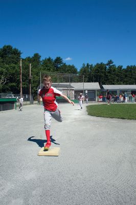 Wareham Gatemen
Joe Pesta sprints to first base during Old Rochester Youth Baseball’s clinic with the Wareham Gatemen on Saturday morning at Gifford Park in Rochester. The Cape Cod Baseball League team worked with Tri-Town players at several stations including hitting, fielding, base running and T-ball. Photo by Mick Colageo. July 14, 2022 edition 
