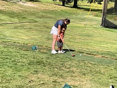 Golf Training
Young golfers from a group of 55 attending three training sessions last week take aim under the watchful eye of volunteers. Photos courtesy Paul Jellison
