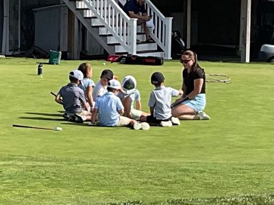 Golf Training
Young golfers from a group of 55 attending three training sessions last week take aim under the watchful eye of volunteers. Photos courtesy Paul Jellison
