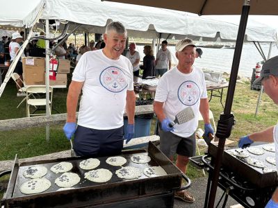 Harbor Days 
Cakes were on the griddle, and patriotism was in the air, as residents and visitors were greeted by the annual Harbor Days festival hosted by the Lions Club last weekend in Shipyard Park. Photo courtesy of the Mattapoisett Lions Club and Immediate Past King Lion Robert Haley
