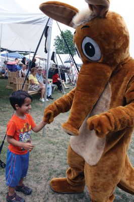 Harbor Days 
Harbor Days came to Mattapoisett this past weekend, and many visitors were gracious enough to spin The Wanderer Wheel for a $1 donation to the Lions Club. Those who played helped raise an extra $523 the Lions Club will use to benefit the community. The Aardvark came out too, but since furry aardvarks hate hot weather, he only made a couple of appearances. Photos by Jean Perry
