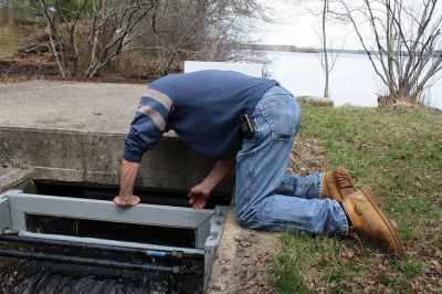 Herring Run
Herring Inspector Davis Watling Jr. marks how many herring have returned to Snipatuit Pond via the Mattapoisett River on Monday, April 24. (Right) This is the final hurdle the herring must make before returning home to spawn the next generation of alewives. Photos by Jean Perry
