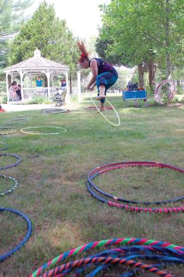 Hula-hoop Performer
Hula-hoop performer Pinto Bella taught kids the benefit of hula-hooping for body and mind and performed superhero-themed tricks on June 20 at Plumb Library. Photos by Colin Veitch
