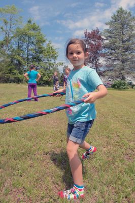 Hula-hoop Performer
Hula-hoop performer Pinto Bella taught kids the benefit of hula-hooping for body and mind and performed superhero-themed tricks on June 20 at Plumb Library. Photos by Colin Veitch
