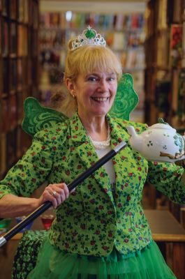 Irish Fairy Godmother
Bringing with her a magical teapot, the Irish Fairy Godmother visited the Joseph H. Plumb Memorial Library March 7, treating about 25 kids to a magic show. Magician Debbie O’Carroll said her favorite part about being the Irish Fairy Godmother is seeing the cheerful responses from her young audience. Photos by Felix Perez
