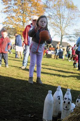 Family Fun Festival 
The 3rd annual Family Fun Festival sponsored by the Mattapoisett Lions treated families to a day of fall time fun on November 4 with games like pumpkin bowling, pin the nose on the pumpkin, and corn hole, along with free hayrides throughout the village. Photos by Jean Perry
