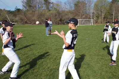 Old Rochester Little League
The Old Rochester Little League celebrated its Opening Day of the 2016 season on Saturday, April 30 at Gifford Park off Dexter Road in Rochester. The young athletes took part in the traditional Opening Day parade, which began at Dexter Park and concluded at Dexter Field. The players then circled the field for the National Anthem, with a flyover by Glenn Lawrence in his plane. After opening ceremonies, the first games of the season were held. Photo by Colin Veitch
