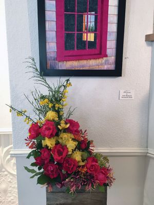 Marion Art Center
Peter Hussey’s “Looking South Then West” painting is the inspiration for Judy Hagar and Bernadette Kelly’s floral interpretation at the Art In Bloom event at the Marion Art Center. 
Hussey and Janet Gendreau’s paintings are on view through July 6. Photo by Marilou Newell

